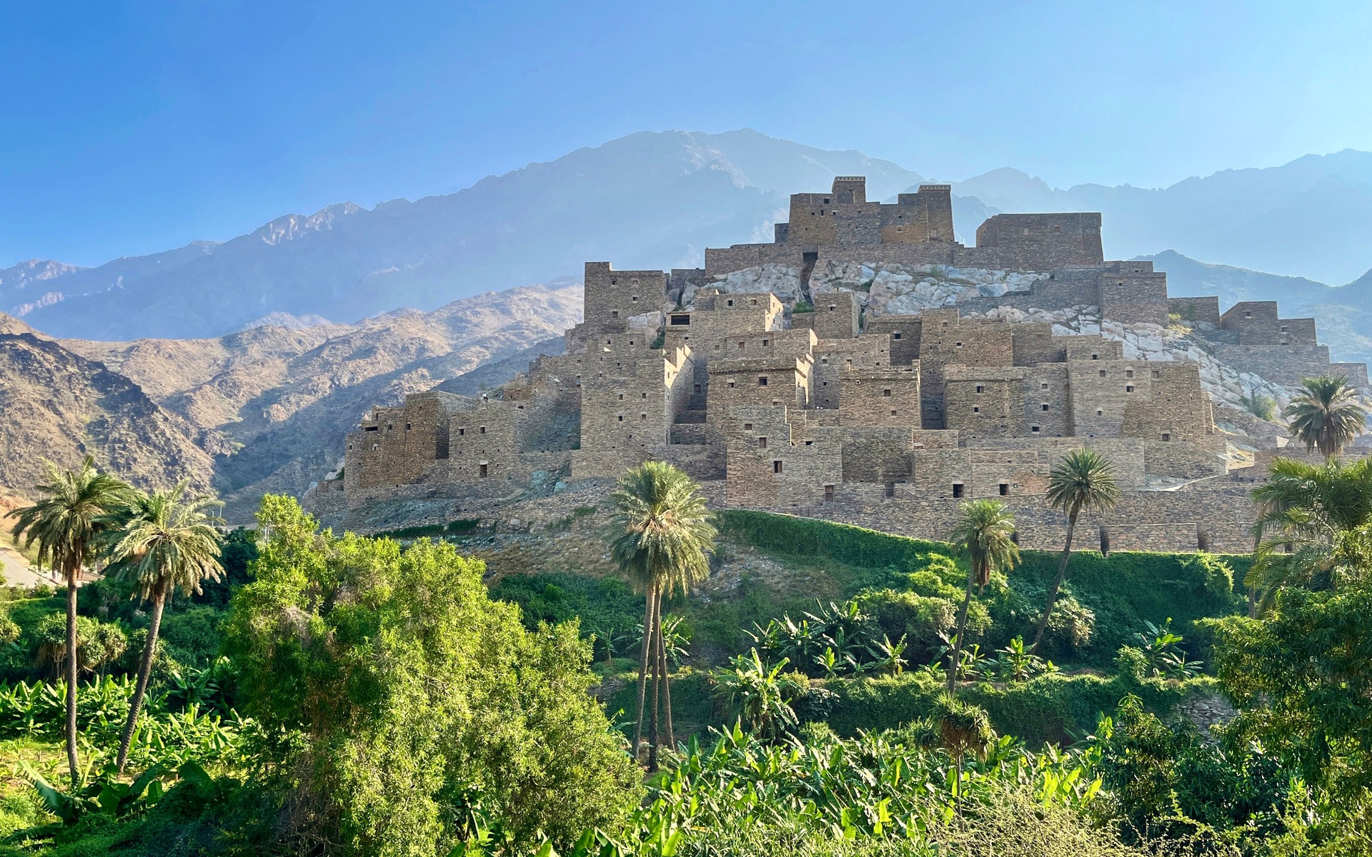 Ancient stone village framed by the mountain landscape of Al Bahah, Saudi Arabia