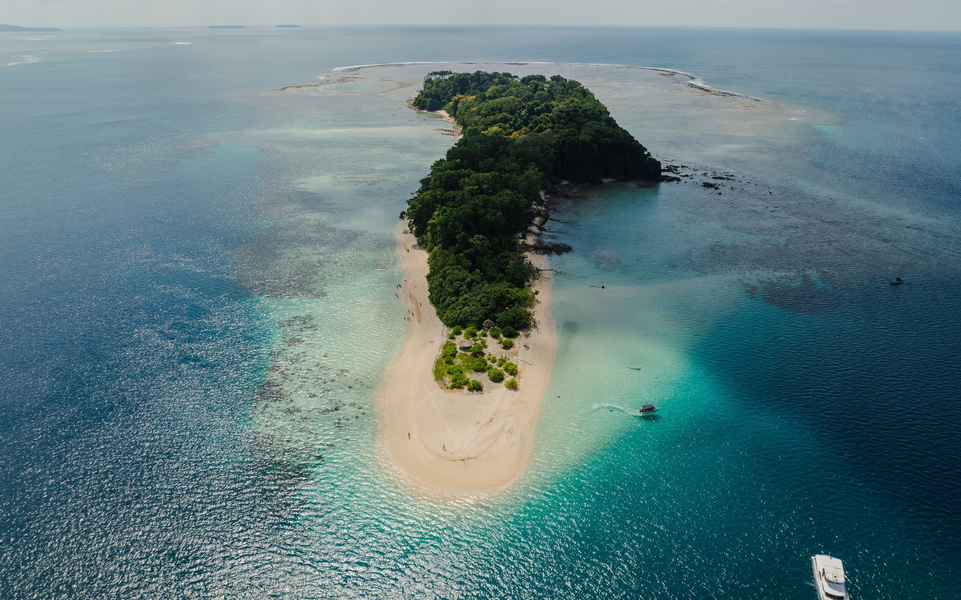 Aerial view of Jolly Buoy Island, its white sandbar and turquoise reef in the Andaman Islands, India
