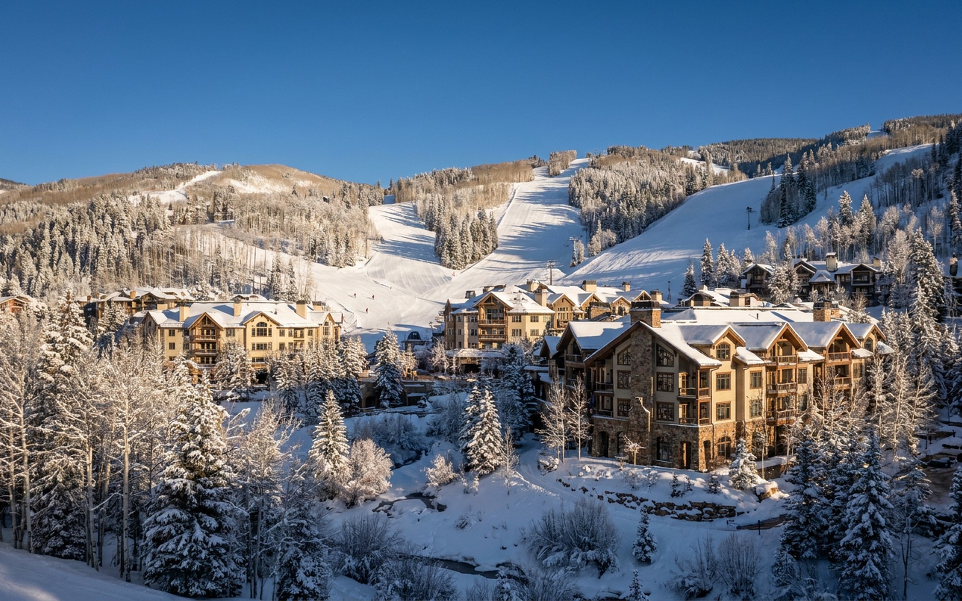 Luxury ski resort village with beautifully groomed slopes, nestled amongst snow-covered aspen and pine forests, under a crisp blue winter sky. at Beaver Creek, United States — original Triple VIP destination visual.