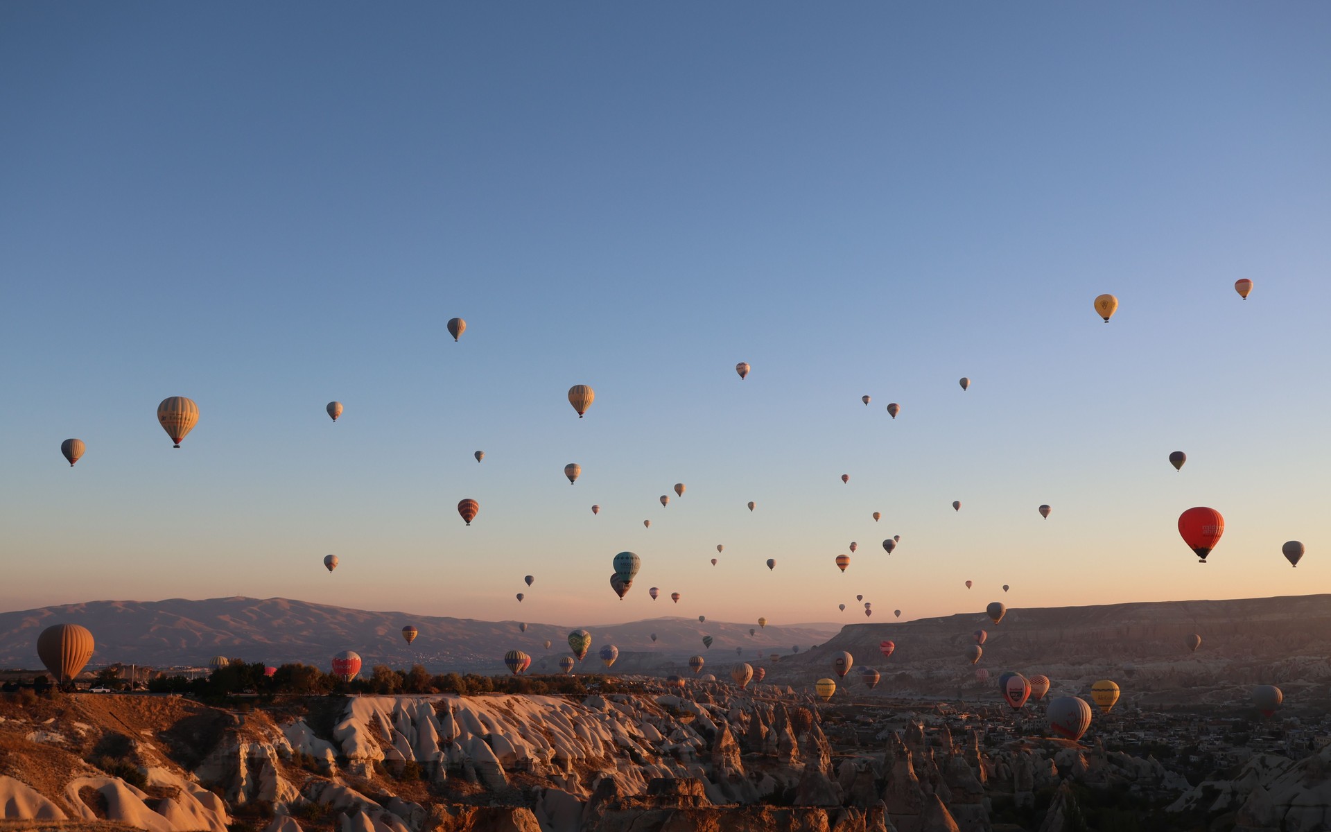 A photograph of Cappadocia Balloon Season, Turkey.