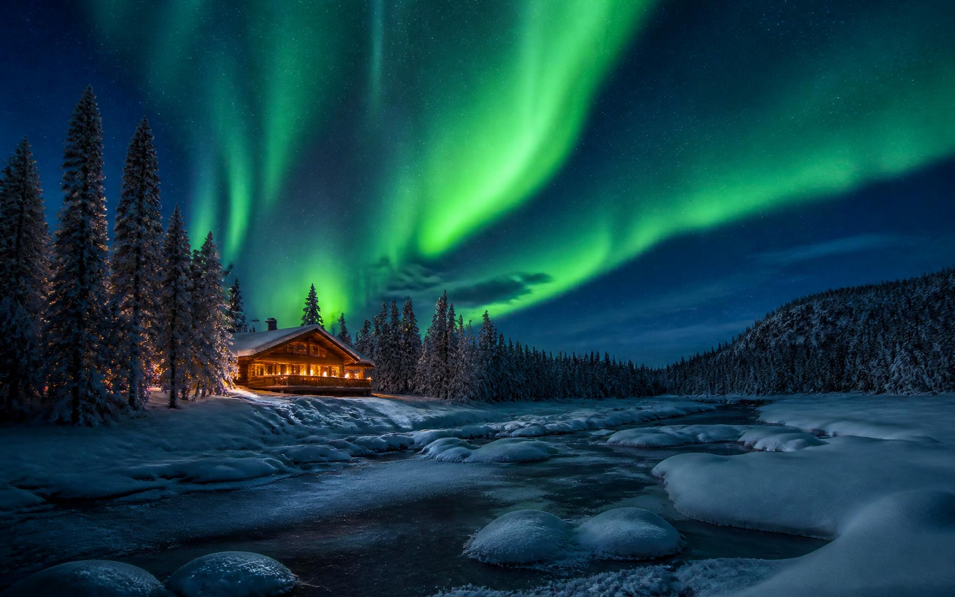 snow-laden pine forest under green aurora light above a frozen river at Swedish Lapland — original Triple VIP destination visual.