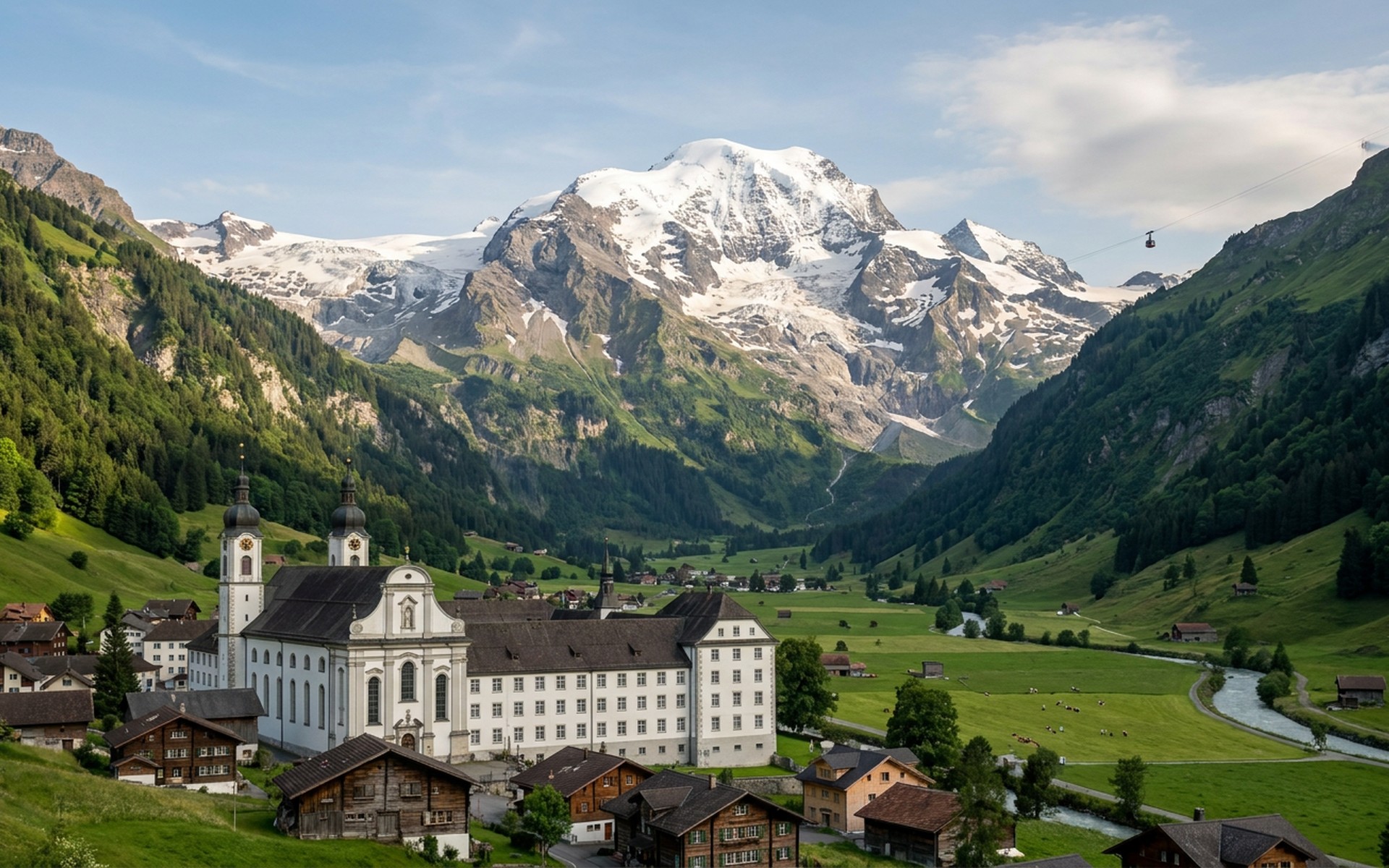 The majestic Mount Titlis, covered in pristine white snow, dominating the alpine landscape above Engelberg village with lush green valleys below in summer. at Engelberg, Switzerland — original Triple VIP destination visual.