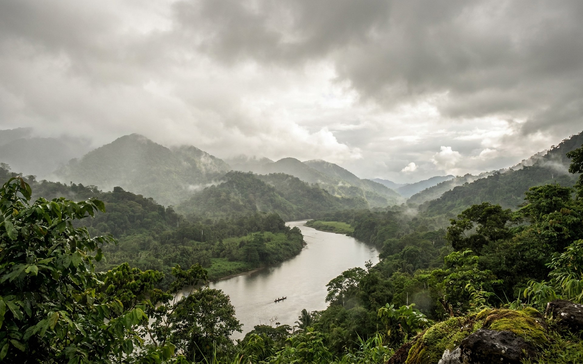 Misty, lush rainforest canopy cascading down verdant mountains, with a winding river visible below, under a dramatic, cloudy tropical sky during the wet season. at Papua New Guinea, Papua New Guinea — original Triple VIP destination visual.