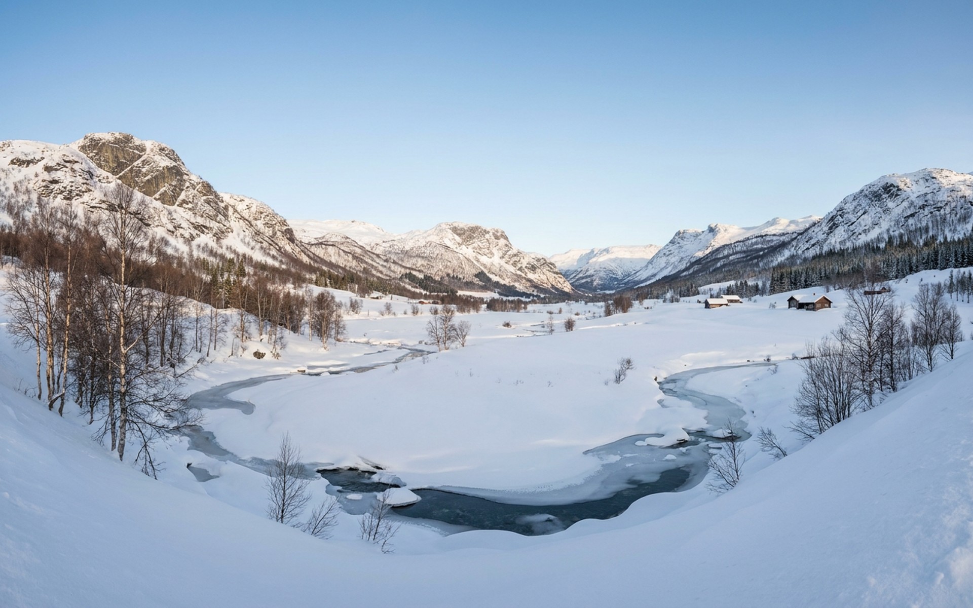 Panoramic view of Hemsedal valley blanketed in pristine white snow, surrounded by towering, snow-covered mountains under a crisp winter sky. at Hemsedal, Norway — original Triple VIP destination visual.