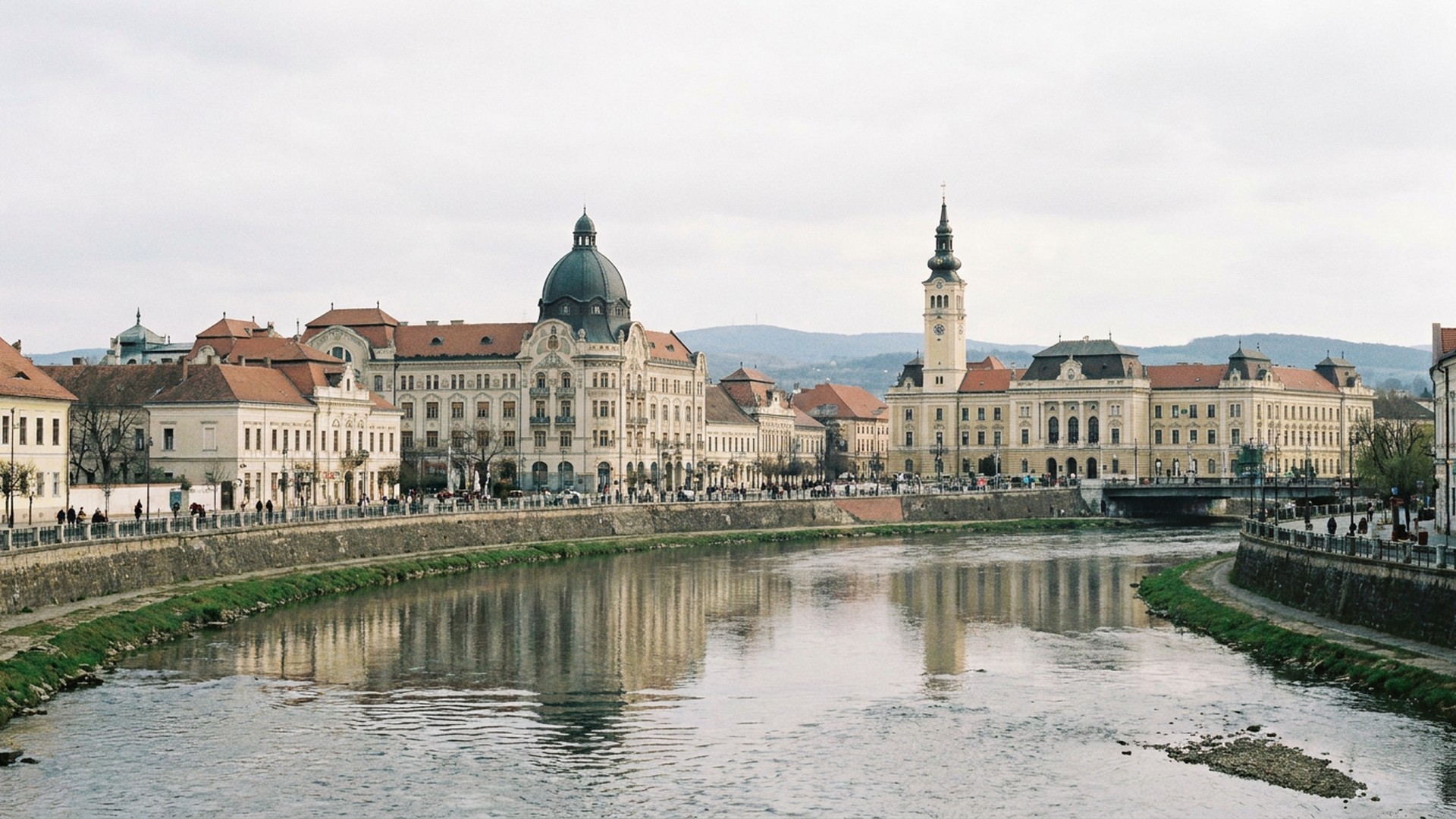 The city seen across its water in Oradea, Romania