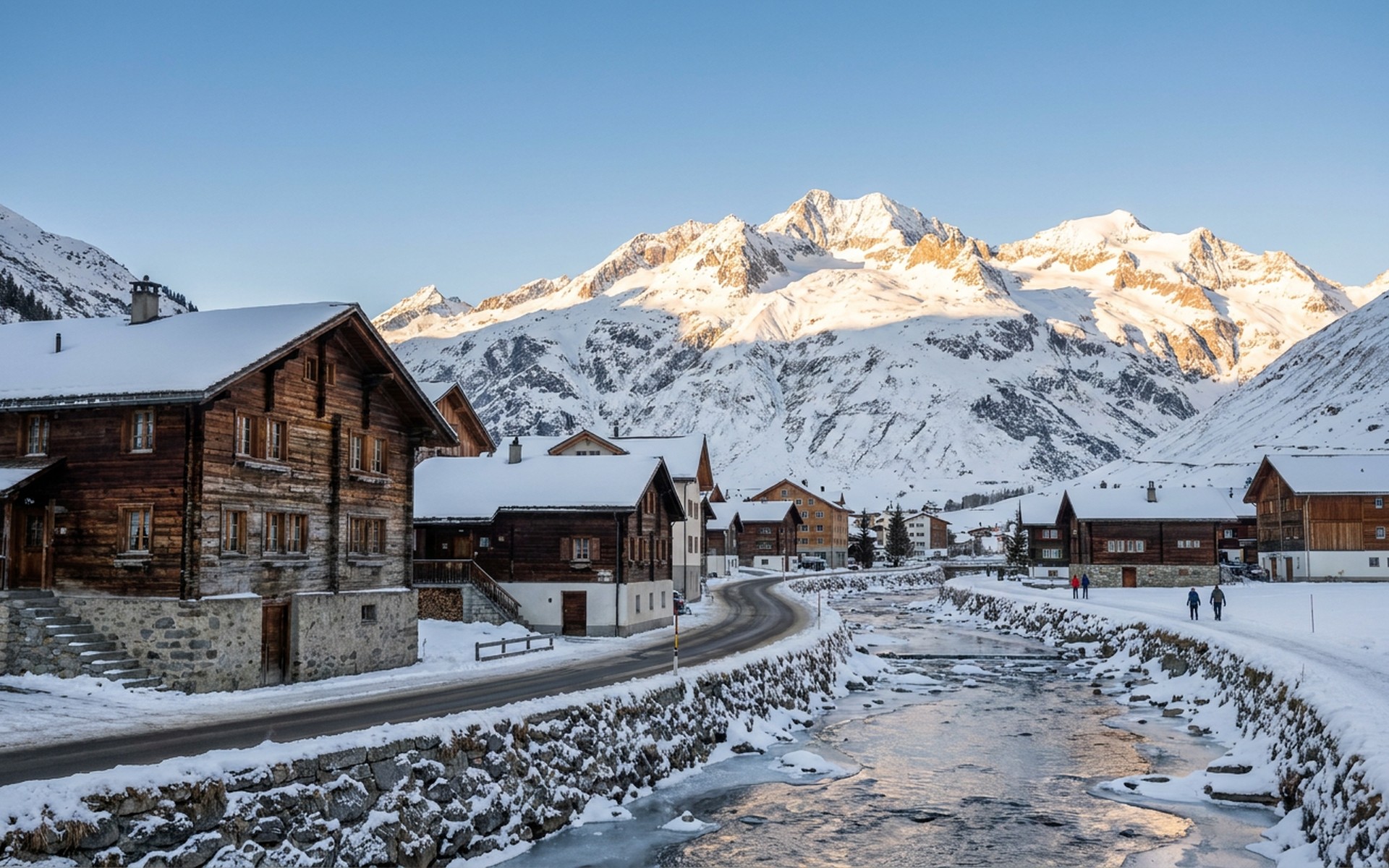 Traditional Swiss chalets and a charming village against a backdrop of majestic, snow-covered Alps, glowing under an afternoon winter sun. at Andermatt, Switzerland — original Triple VIP destination visual.