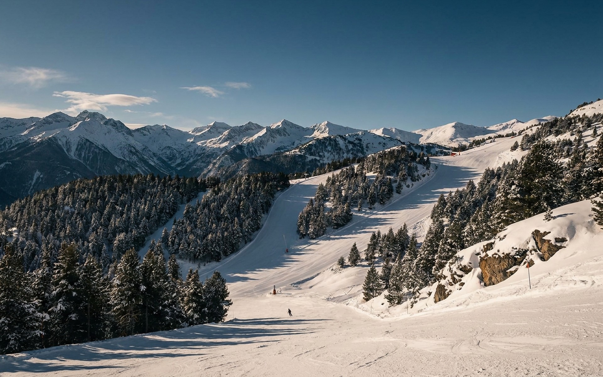 Expansive, pristine ski slopes winding through snow-laden pine forests, with sunlit Pyrenean peaks towering in the winter distance. at Grandvalira, Andorra — original Triple VIP destination visual.