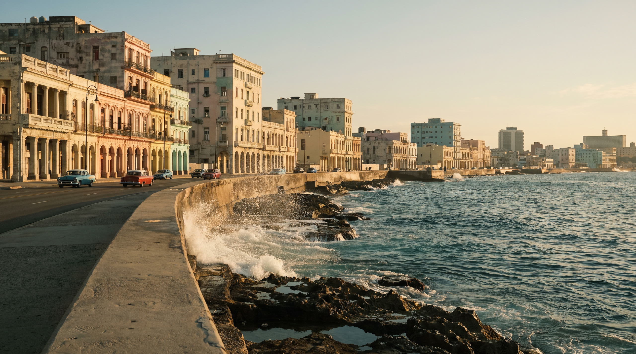 the Malecón seawall with weathered pastel colonial façades behind at Havana, Cuba, in late afternoon light — original Triple VIP destination visual.