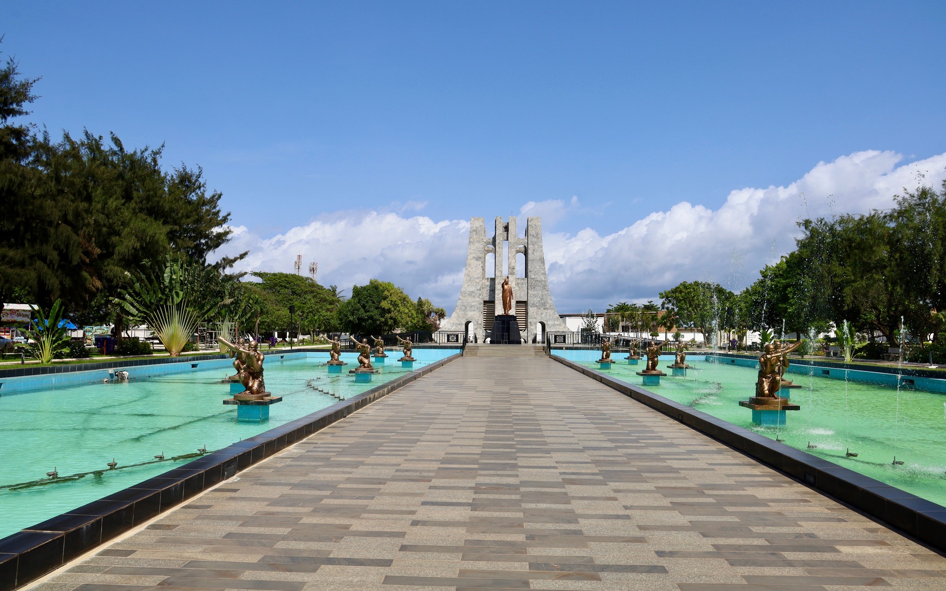 Kwame Nkrumah Memorial Park and fountains beneath a clear sky in Accra, Ghana