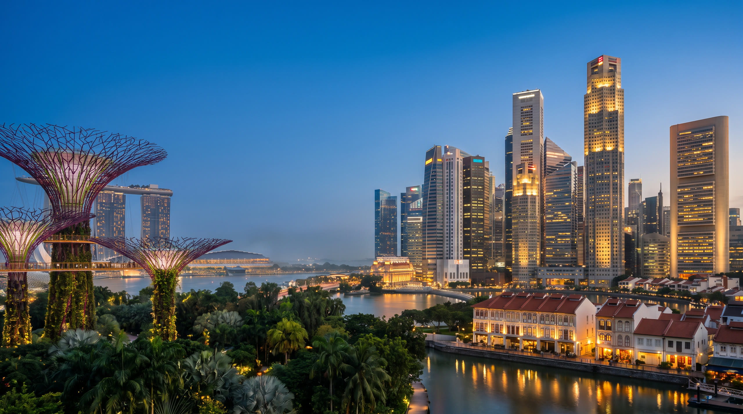 the Marina Bay waterfront with supertree gardens and the bay skyline at Singapore, Singapore, in blue hour light — original Triple VIP destination visual.