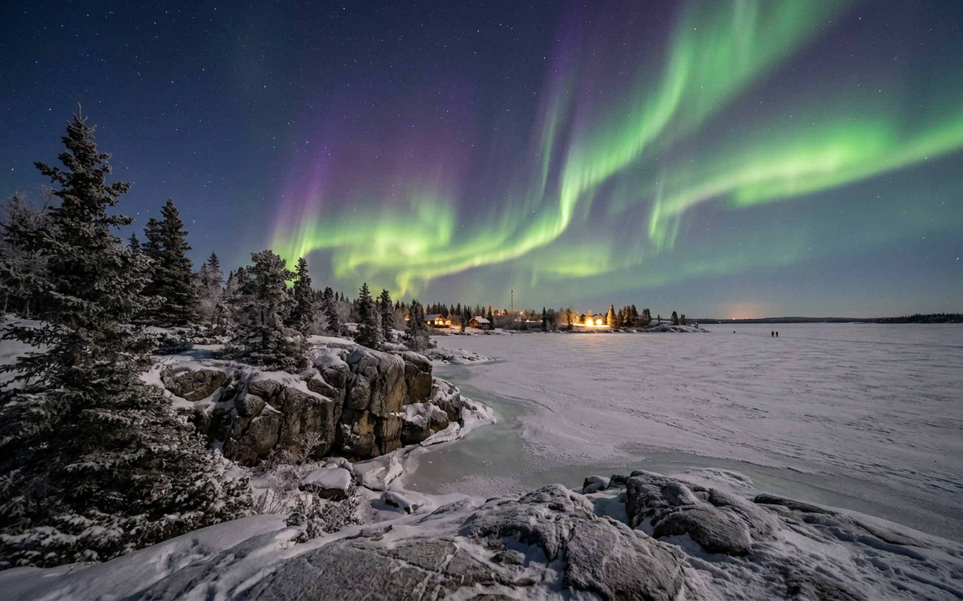 Vivid green and purple aurora borealis dancing across a dark winter sky over frozen Great Slave Lake, with snow-covered trees. at Yellowknife, Canada — original Triple VIP destination visual.