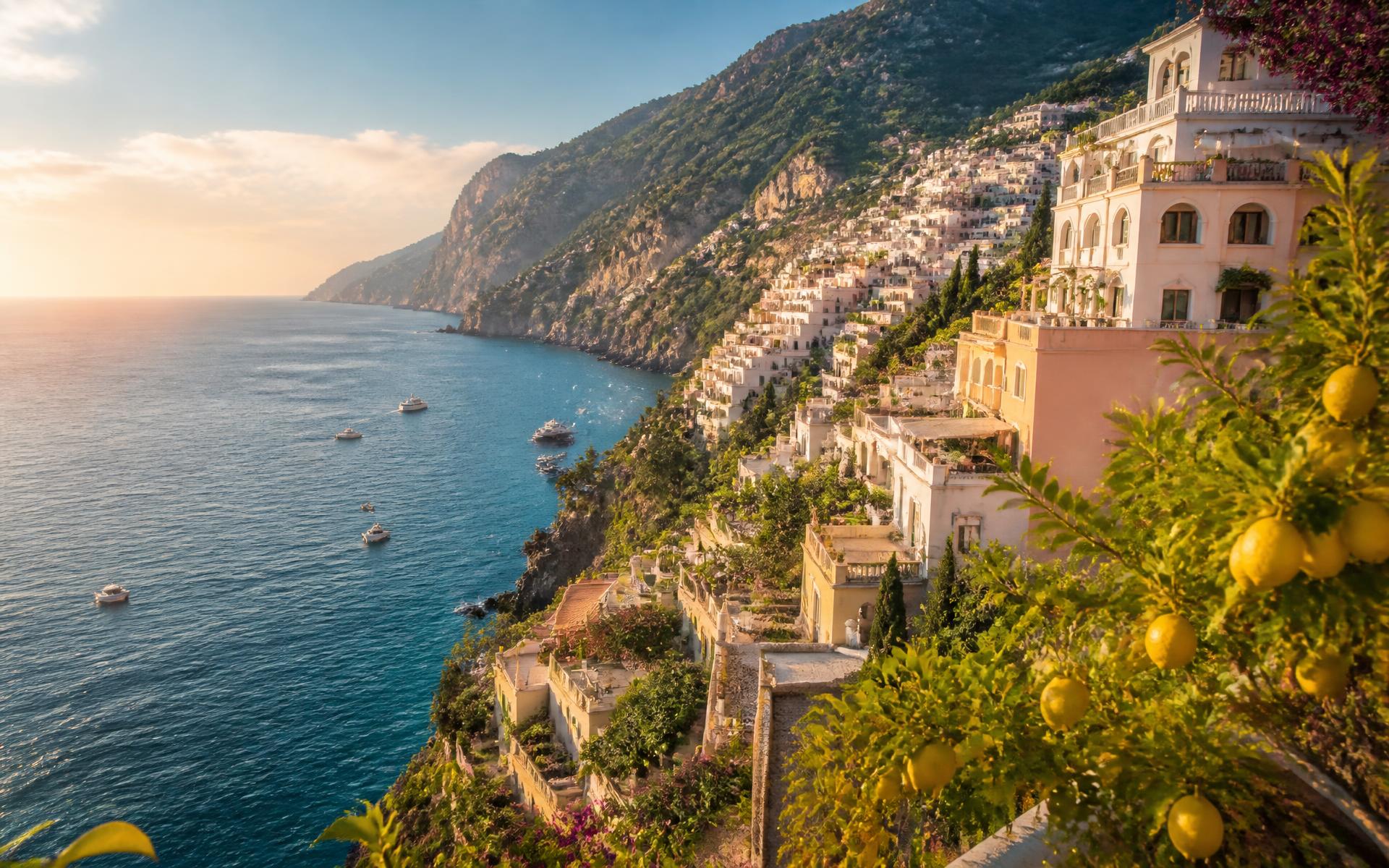 Pastel cliffside villages and lemon terraces above the Tyrrhenian Sea on the Amalfi Coast, Italy