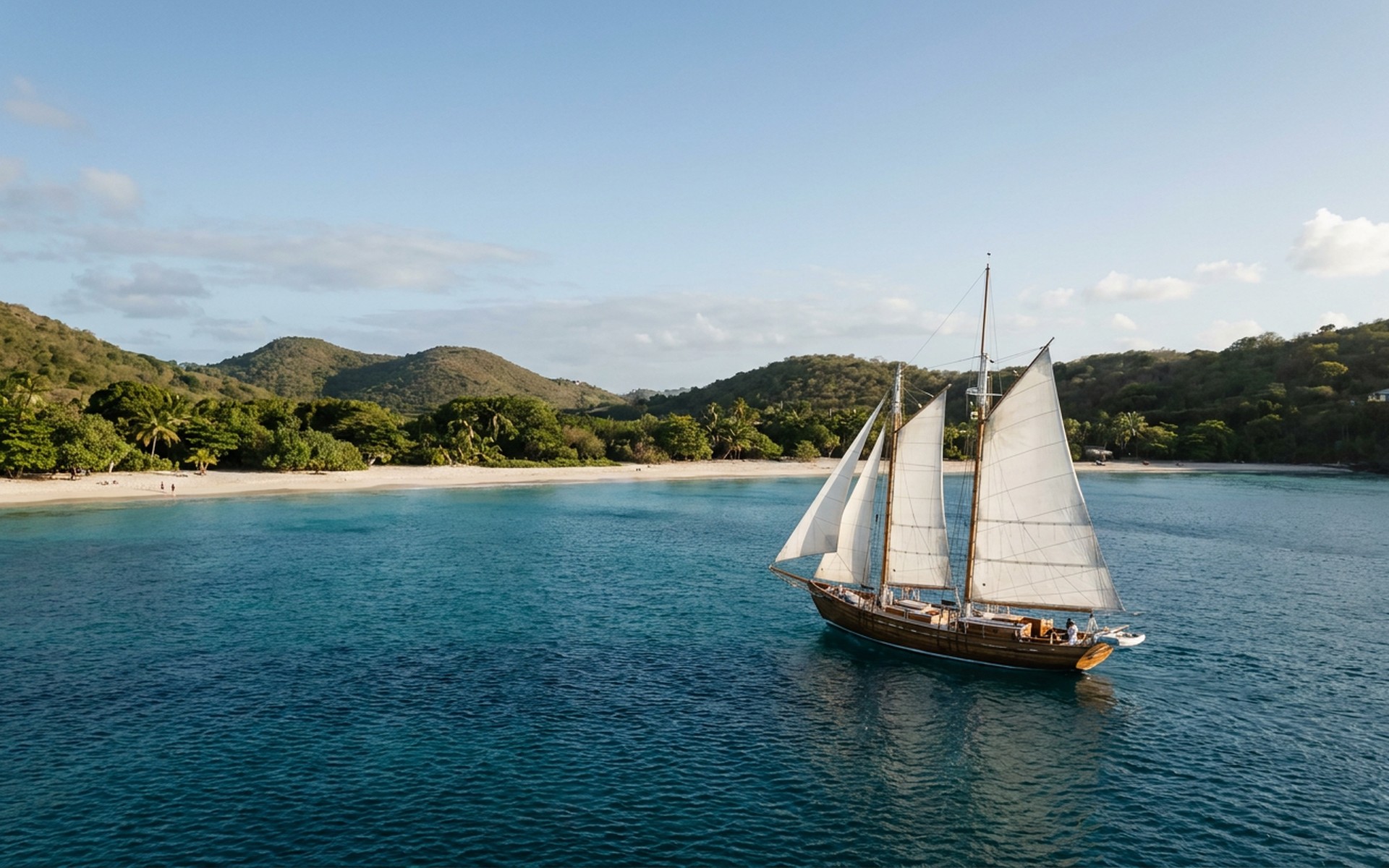 A classic wooden schooner sailing across clear sapphire waters near Princess Margaret Beach in Bequia, with lush green hills under a bright sky. at Bequia & the Grenadines, Saint Vincent and the Grenadines — original Triple VIP destination visual.